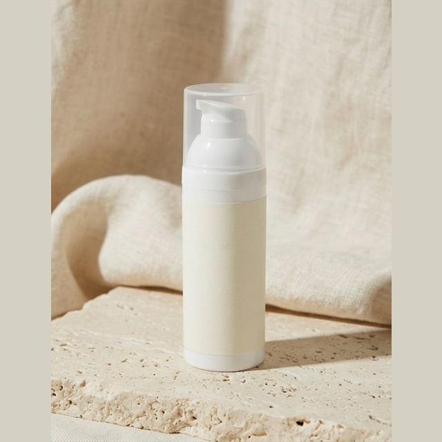 Purelia Acne Care Moisturiser — Purelia-labelled product arranged on stone and linen